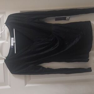 Jennifer Lopez black long sleeved shirt